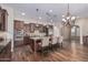 Modern kitchen with granite countertops, stainless steel appliances, and an island at 2717 W Nighthawk Way, Phoenix, AZ 85045