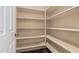 Large walk-in pantry with ample shelving for storage at 2717 W Nighthawk Way, Phoenix, AZ 85045