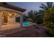 Inviting pool area with covered patio and landscaping at 2717 W Nighthawk Way, Phoenix, AZ 85045