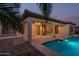 Luxury pool and spa with outdoor lighting and patio at 2717 W Nighthawk Way, Phoenix, AZ 85045