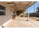 Covered patio with seating area and access to backyard at 3433 W Poinsettia Dr, Phoenix, AZ 85029