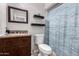 Bathroom with a shower and granite countertop at 3433 W Poinsettia Dr, Phoenix, AZ 85029