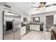 Kitchen with stainless steel appliances and white cabinets at 3433 W Poinsettia Dr, Phoenix, AZ 85029