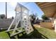 Backyard playset with slide and climbing features at 3433 W Poinsettia Dr, Phoenix, AZ 85029