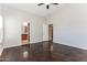 Bright bedroom with access to bathroom and stained concrete floors at 34831 N Mashona Trl, San Tan Valley, AZ 85143