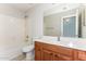 Clean bathroom with single sink vanity and bathtub at 34831 N Mashona Trl, San Tan Valley, AZ 85143