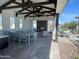 Community covered pavilion with tables, chairs, fireplace, and ping pong at 2594 E Bluff Spring Ave, Apache Junction, AZ 85119