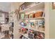 Well-stocked pantry with shelves and various food items at 2650 W Union Hills Dr # 184, Phoenix, AZ 85027