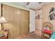 Bedroom with wood closet and view of hallway at 2650 W Union Hills Dr # 184, Phoenix, AZ 85027