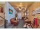 Relaxing living room with a ceiling fan and rocking chair at 2650 W Union Hills Dr # 184, Phoenix, AZ 85027