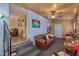 Bright living room with a comfy couch and view to another room at 2650 W Union Hills Dr # 184, Phoenix, AZ 85027