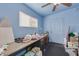 Small office with desk, window, and ample storage at 2650 W Union Hills Dr # 184, Phoenix, AZ 85027