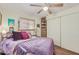 Bedroom with purple bedding and large closet at 2650 W Union Hills Dr # 184, Phoenix, AZ 85027