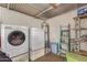 Bright laundry room with washer, dryer, and storage at 2650 W Union Hills Dr # 184, Phoenix, AZ 85027