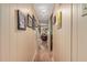Hallway with light wood floors and wall art at 2650 W Union Hills Dr # 184, Phoenix, AZ 85027