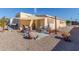 Relaxing patio area with shade cover, seating, and potted plants at 2650 W Union Hills Dr # 184, Phoenix, AZ 85027