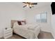 Bedroom with a queen bed and calming decor at 33970 N Cobble Stone Dr, San Tan Valley, AZ 85143