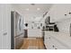 Modern kitchen featuring stainless steel appliances and white cabinets at 33970 N Cobble Stone Dr, San Tan Valley, AZ 85143