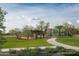 Community playground with play structures and shaded areas at 2445 W Rowel Rd, Phoenix, AZ 85085