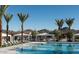 Inviting community pool with cabanas and lounge chairs at 2445 W Rowel Rd, Phoenix, AZ 85085