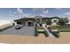 Modern home with stone and stucco exterior, plus landscaped yard at 5516 W Melinda Ln, Glendale, AZ 85308