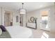 Bright bedroom with queen bed and access to backyard at 18191 W Cielo Grande Ave, Surprise, AZ 85387