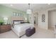 Main bedroom with king-size bed and ensuite bathroom access at 18191 W Cielo Grande Ave, Surprise, AZ 85387