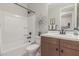 Clean bathroom with tub, shower, and vanity at 18191 W Cielo Grande Ave, Surprise, AZ 85387
