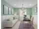 Bright office space with built-in workspace and sofa at 18191 W Cielo Grande Ave, Surprise, AZ 85387