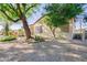 House exterior showcasing desert landscaping and architectural details at 19803 N Desert Song Ct, Surprise, AZ 85374