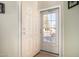 Front entry door with sidelights, offering natural light to the interior at 8500 E Southern Ave # 575, Mesa, AZ 85209