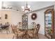 Bright dining area with glass-top table and four chairs at 8500 E Southern Ave # 575, Mesa, AZ 85209
