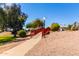 A paved pathway leads through the community with a red bridge at 8500 E Southern Ave # 575, Mesa, AZ 85209
