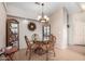 Charming dining room with glass-top table and four chairs at 8500 E Southern Ave # 575, Mesa, AZ 85209