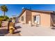 Home's exterior showcasing a patio and surrounding landscape at 8500 E Southern Ave # 575, Mesa, AZ 85209