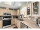 Cozy kitchen with modern appliances and a stylish backsplash at 8500 E Southern Ave # 575, Mesa, AZ 85209