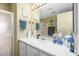 Clean bathroom with updated vanity, mirror, and ample storage at 8500 E Southern Ave # 575, Mesa, AZ 85209