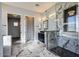 Luxurious bathroom with marble flooring, a large shower, and a soaking tub at 300 W Quartz Rock Rd, Phoenix, AZ 85085