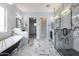 Elegant bathroom boasting a freestanding tub and a walk-in shower with glass enclosure at 300 W Quartz Rock Rd, Phoenix, AZ 85085