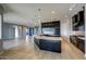 Modern kitchen with large island, stainless steel appliances, and dark cabinetry at 300 W Quartz Rock Rd, Phoenix, AZ 85085