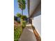 Sidewalk leading to a private patio with landscaping at 10423 W Wheatridge Dr, Sun City, AZ 85373