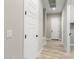 Clean hallway with wood-look floors at 5170 N 186Th Dr, Litchfield Park, AZ 85340