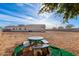 Backyard with mosaic table and benches at 5170 N 186Th Dr, Litchfield Park, AZ 85340