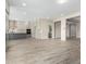 Modern kitchen with gray cabinets, a large island, and stainless steel appliances at 5170 N 186Th Dr, Litchfield Park, AZ 85340