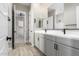 Modern bathroom with double vanity and sleek fixtures at 5170 N 186Th Dr, Litchfield Park, AZ 85340