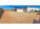 Large backyard with gravel and solar panels at 5170 N 186Th Dr, Litchfield Park, AZ 85340