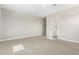 Spacious bedroom with neutral decor and access to a bathroom at 5170 N 186Th Dr, Litchfield Park, AZ 85340