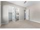Spacious bedroom with access to bathroom and closet at 5170 N 186Th Dr, Litchfield Park, AZ 85340