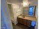 Clean bathroom with light vanity, updated fixtures and a tub at 3500 N Hayden Rd # 1903, Scottsdale, AZ 85251