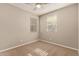 Charming bedroom with two windows and a ceiling fan at 2772 S Betty St, Gilbert, AZ 85295